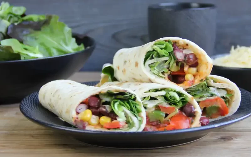 Burrito met bonen, paprika en mais